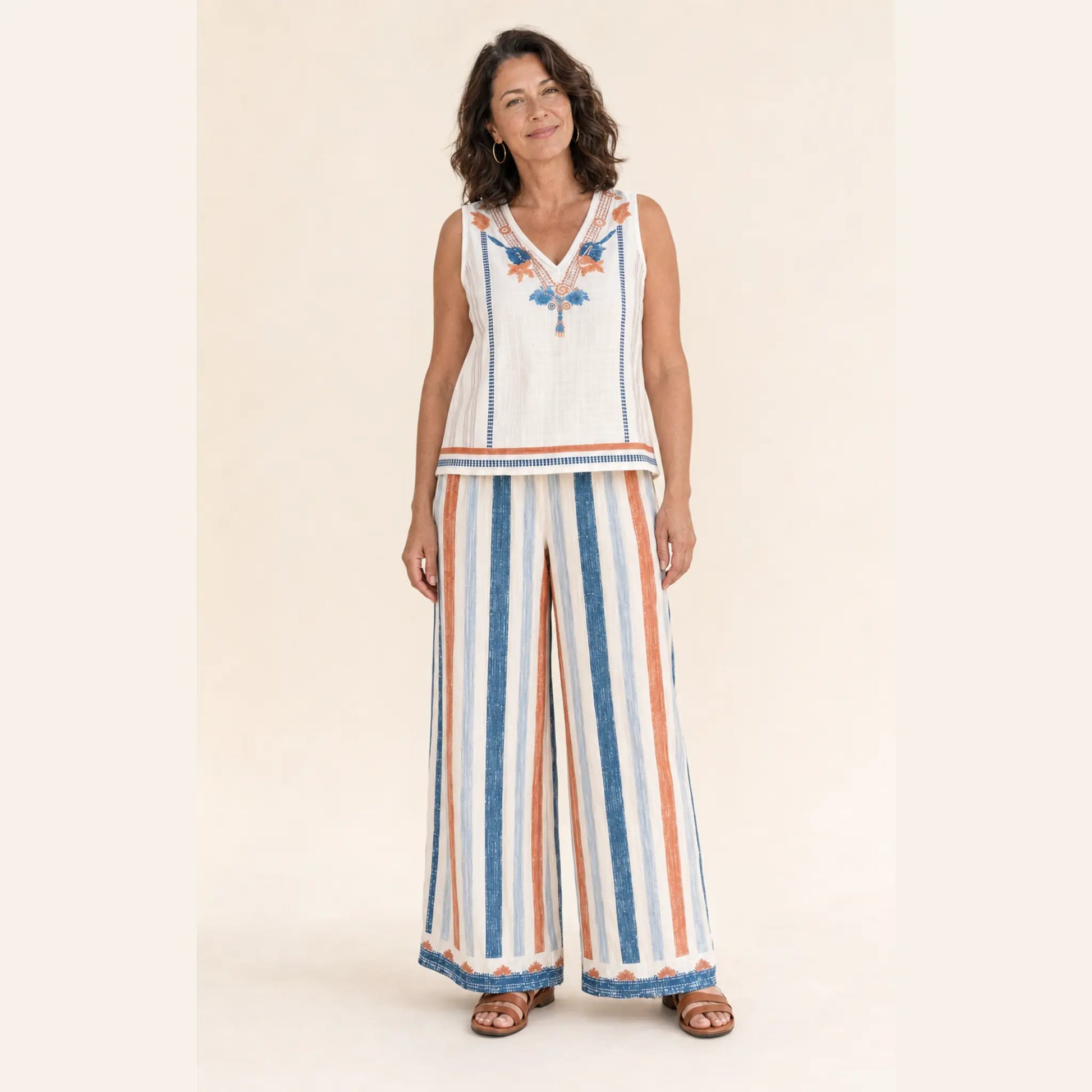 Front view of The Dayaway sleeveless printed top and striped wide-leg pants