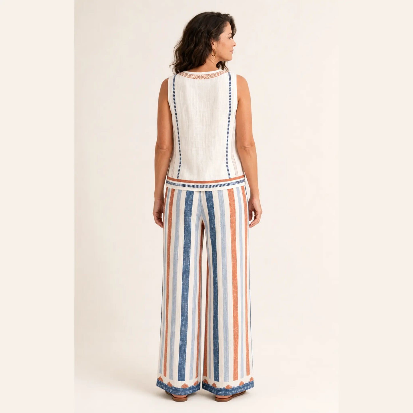 Back view of The Dayaway sleeveless top and full-length striped wide-leg pants