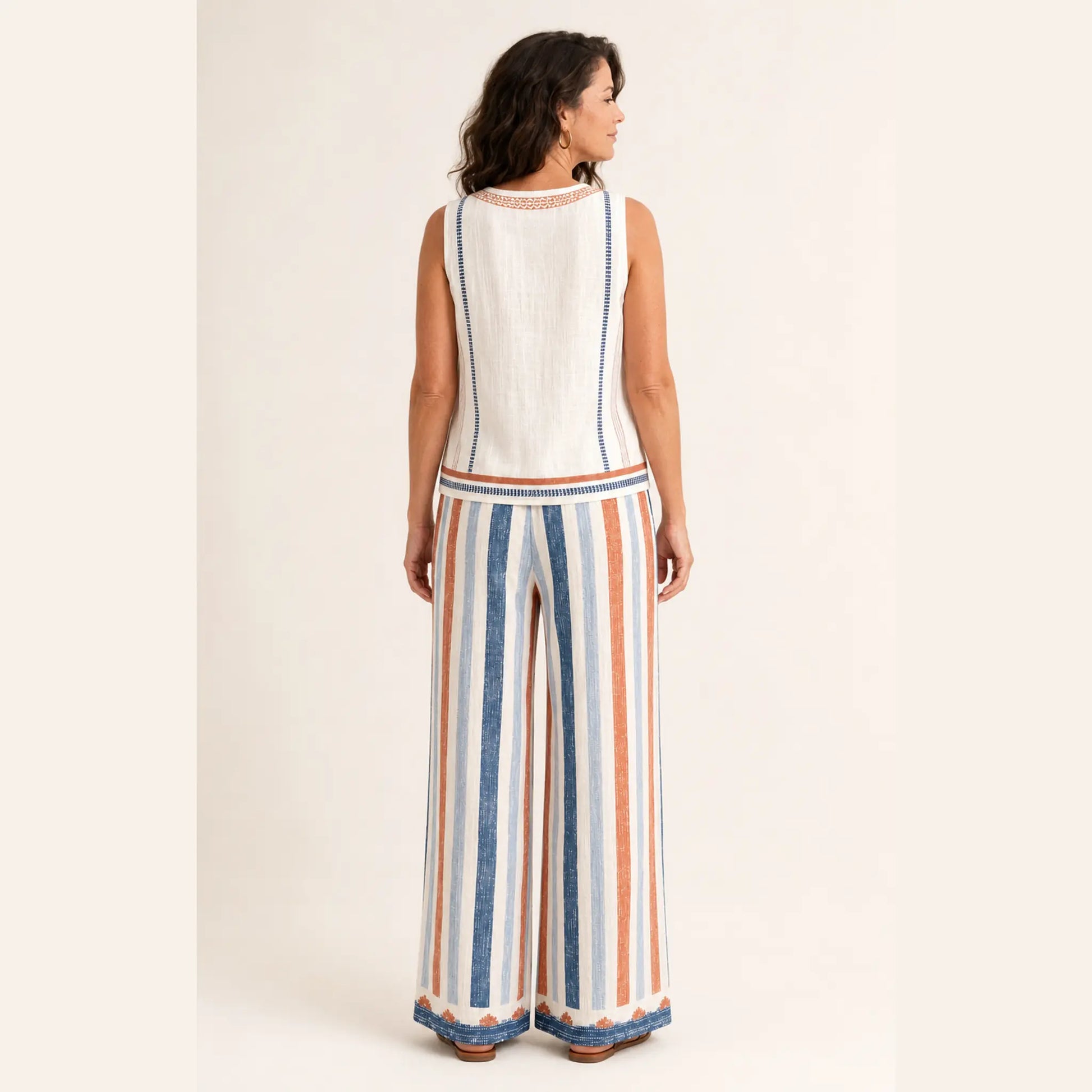 Back view of The Dayaway sleeveless top and full-length striped wide-leg pants