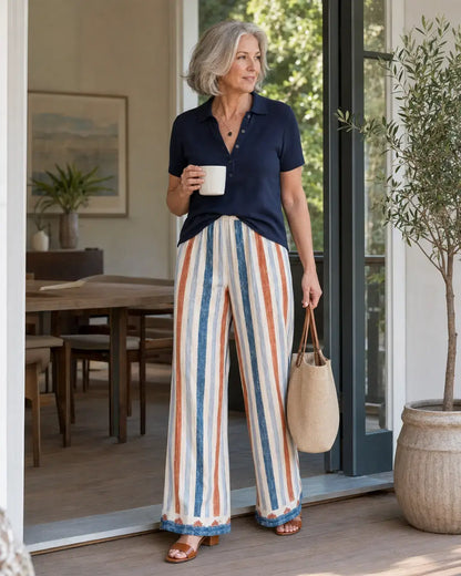  The Dayaway striped wide-leg pants styled with a Deep Navy knit polo