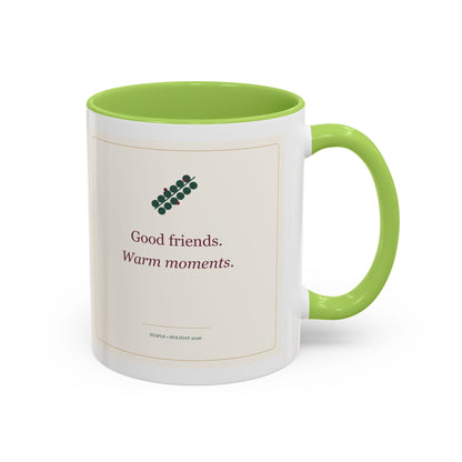 STAPLE Good Friends, Warm Moments 11 oz mug in Light Green, right-handle artwork view; digital Printify mockup.
