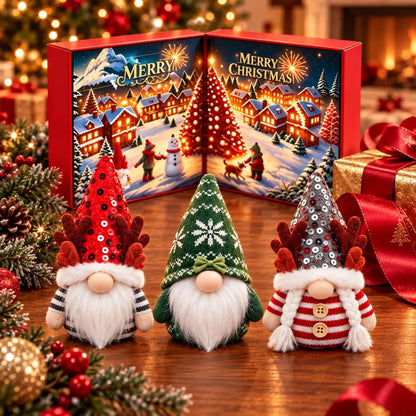 Three Christmas gnomes with red, green and gray hats displayed in front of the calendar box.
