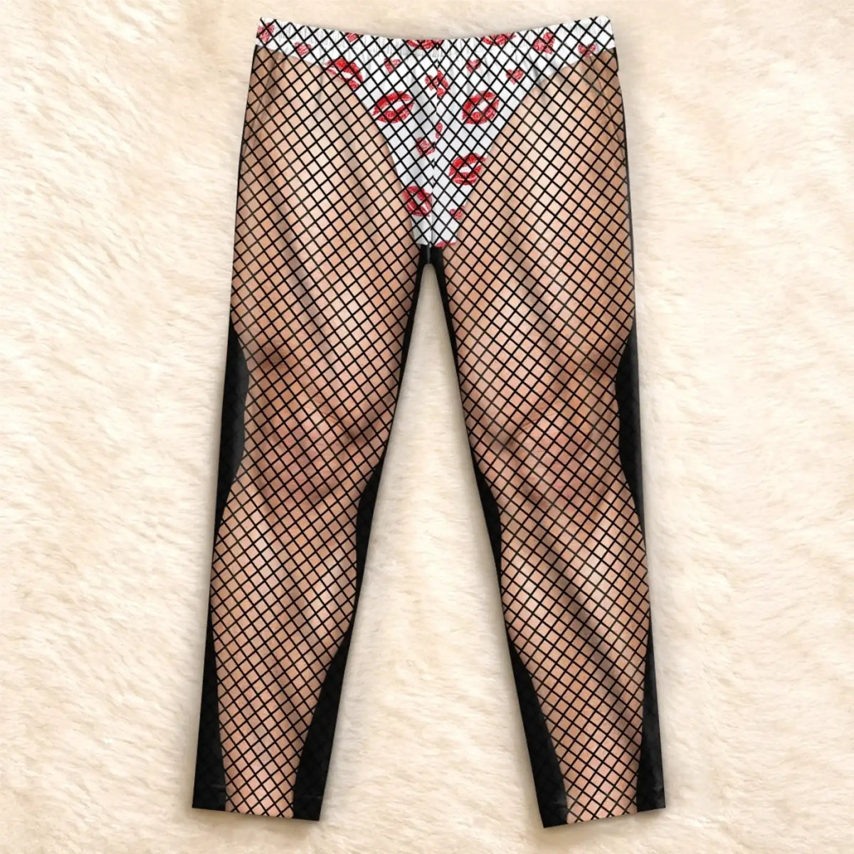 Flat front view of fishnet and red-kisses illusion pajama pants