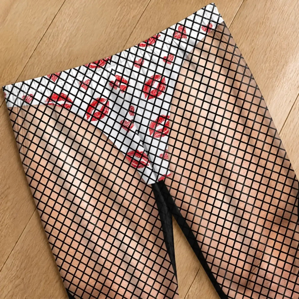 Close-up of the printed white underwear and red lipstick-kiss motif