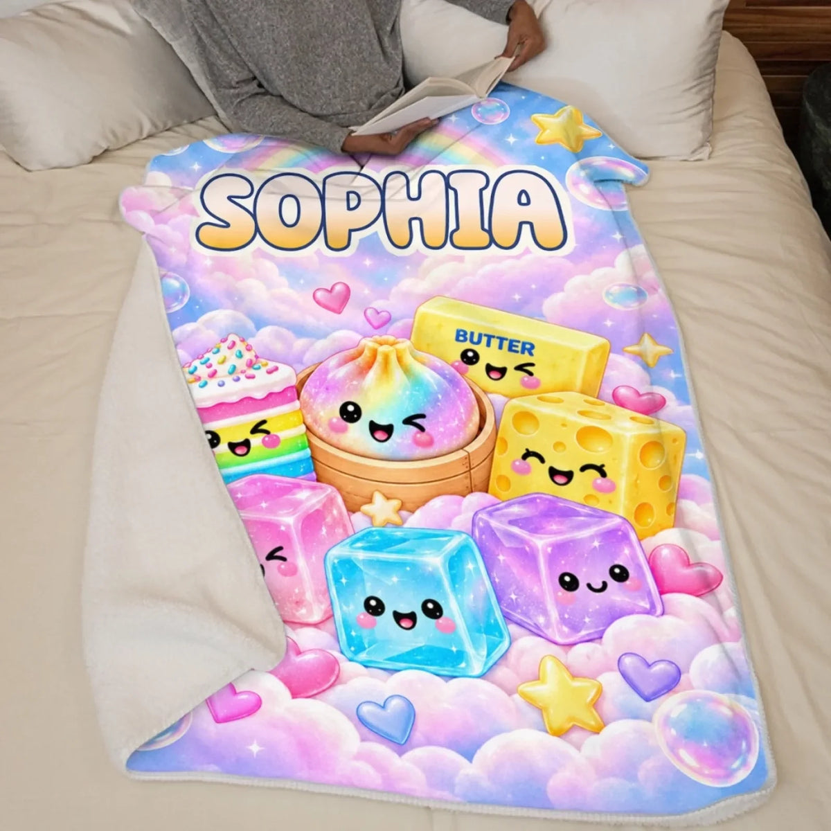 Rainbow name blanket displayed across a bed