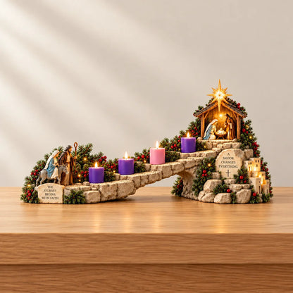 Illustrative product view: Journey to Bethlehem Advent display with four colored markers, a rising stone-look path and Nativity scene on a warm neutral tabletop.