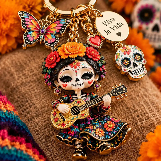 Guitar-playing floral skull character keychain with butterfly and skull charms