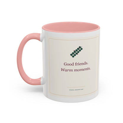 STAPLE Good Friends, Warm Moments 11 oz mug in Pink, left-handle artwork view; digital Printify mockup.