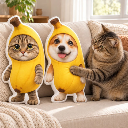 Banana costume pet photo pillows displayed beside a cat