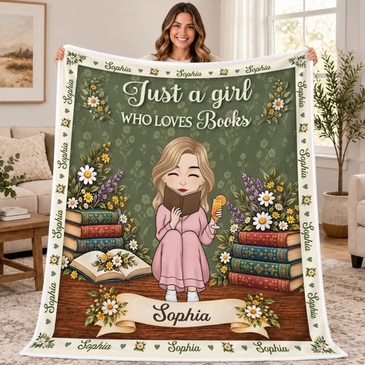 Custom-name floral storytime blanket with illustrated reader, books and Just a girl who loves books message