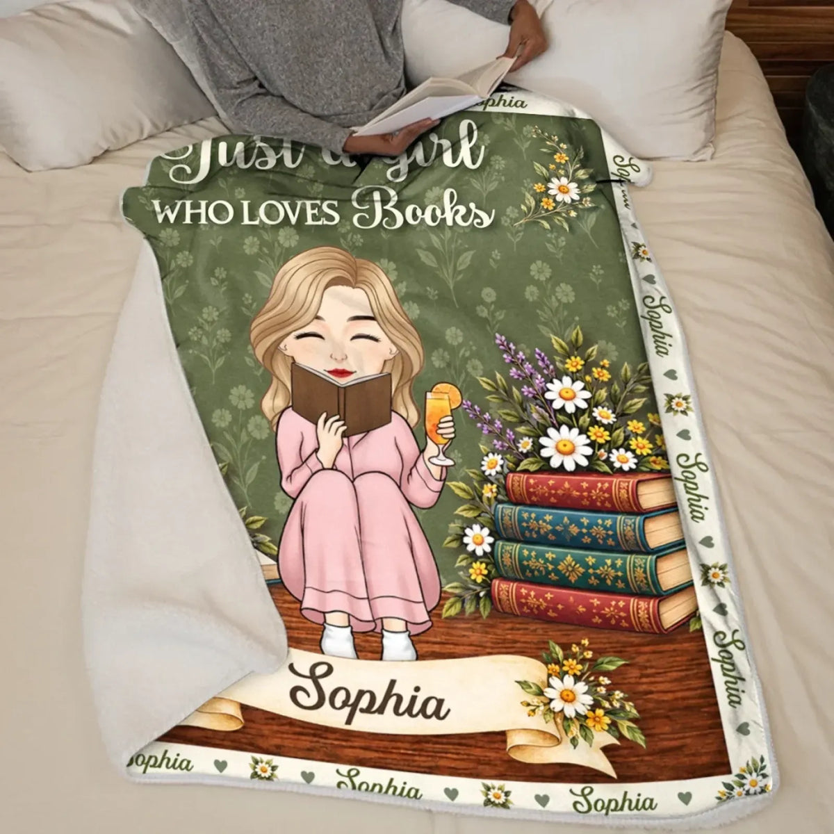 Floral storytime blanket draped across a reader on a sofa