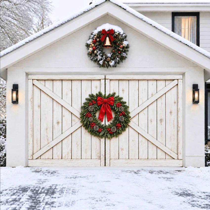 Farmhouse Christmas garage door cover showing white barn doors with an evergreen wreath and red bow, 1.5-door view.