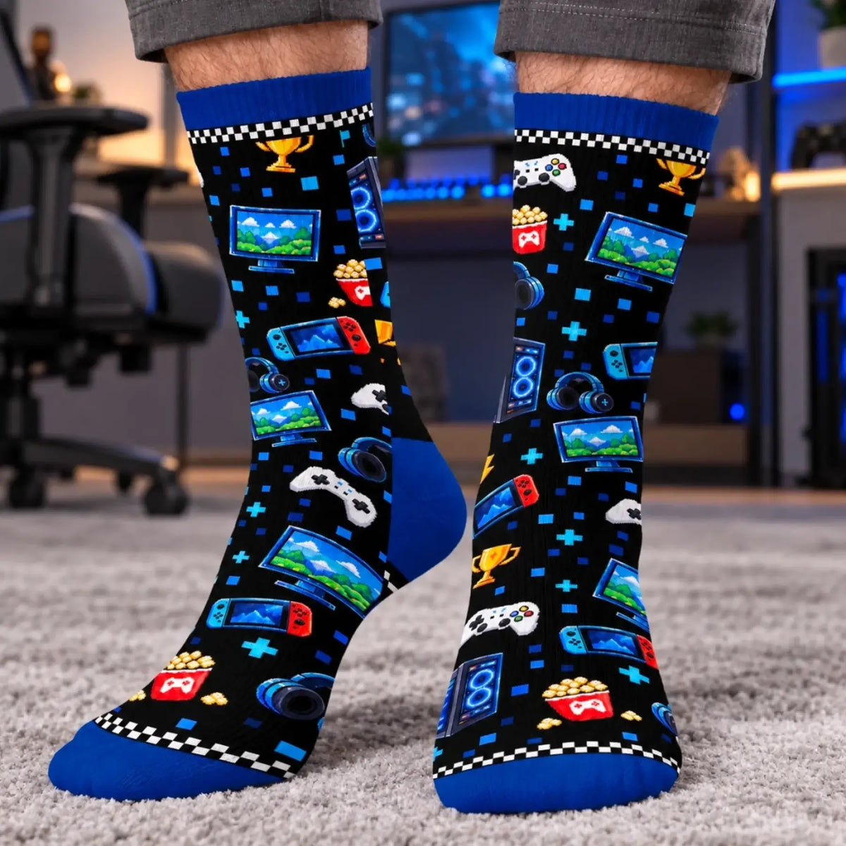 Blue and black gamer crew socks showing the all-over gaming icon pattern