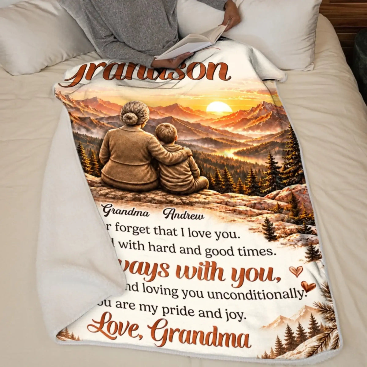 Personalized mountain sunset grandson blanket draped over a chair