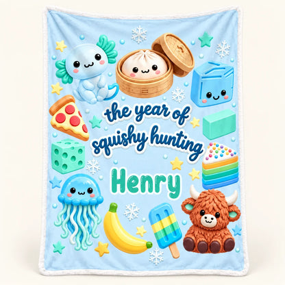 Blue squishy hunting name blanket with Henry sample name and colorful character artwork