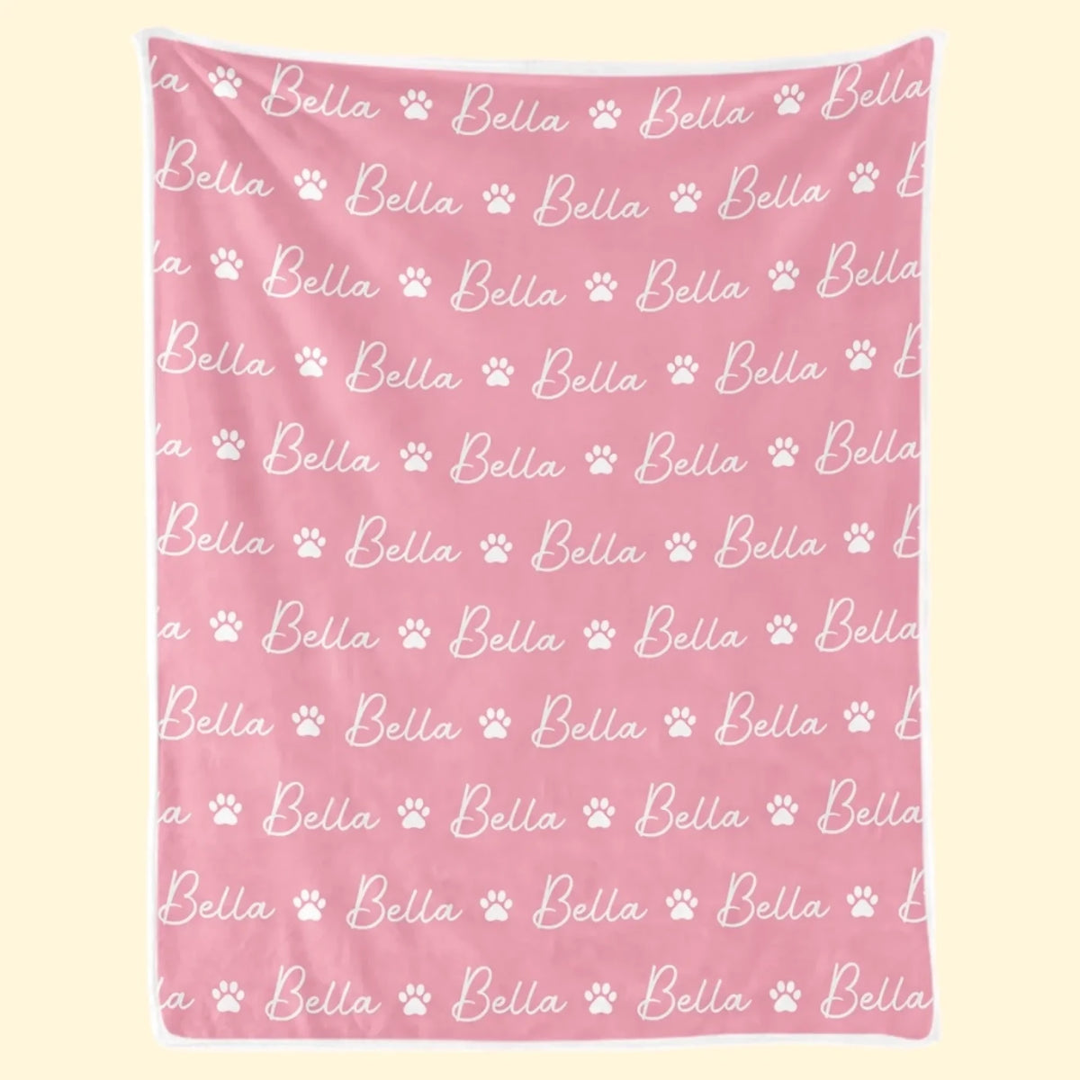 Pink paw-print and name blanket displayed flat