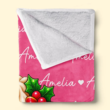 White textured Sherpa backing shown on a pink dumpling character blanket