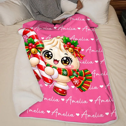 Pink personalized dumpling Christmas blanket displayed on a bed