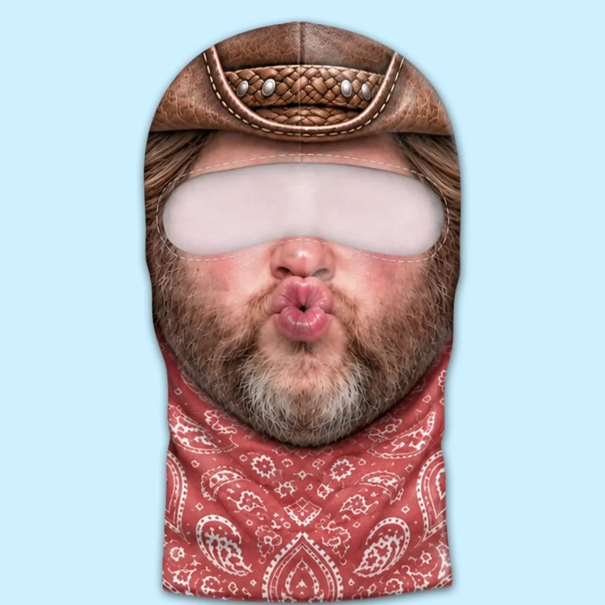 Puckered cowboy print balaclava laid flat, showing the eye opening and red bandana artwork.