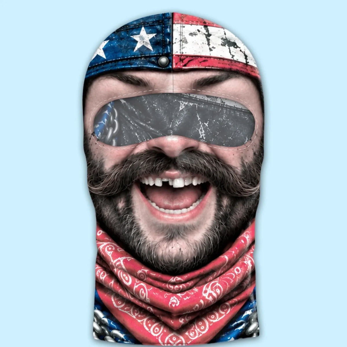 American-flag laughing biker balaclava laid flat, showing its eye opening, laughing face and printed red bandana.