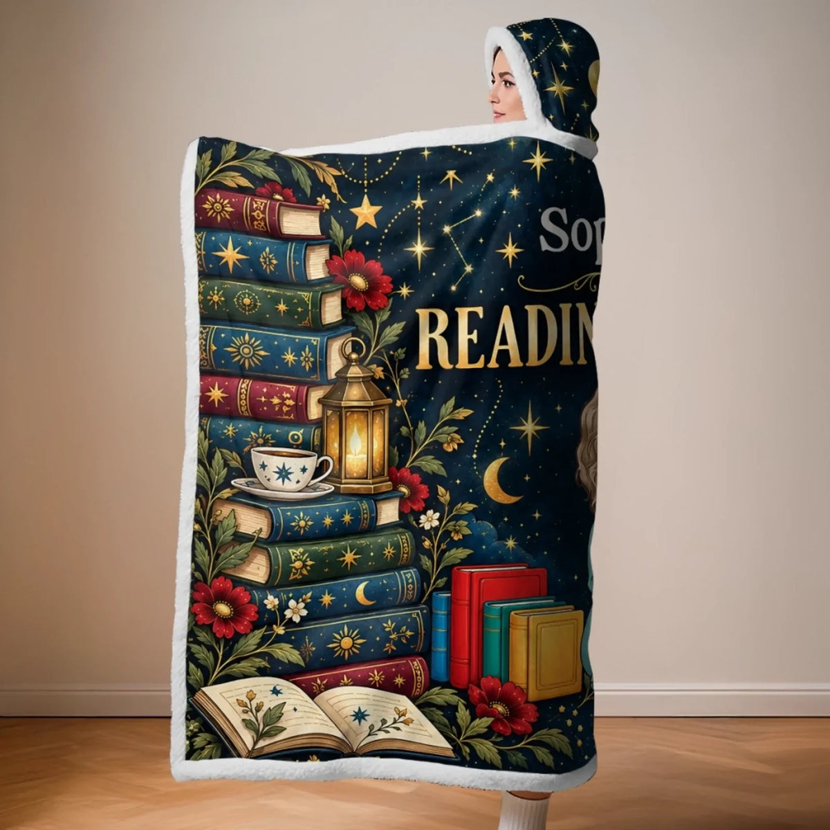 Side view of celestial reading hooded blanket with book artwork