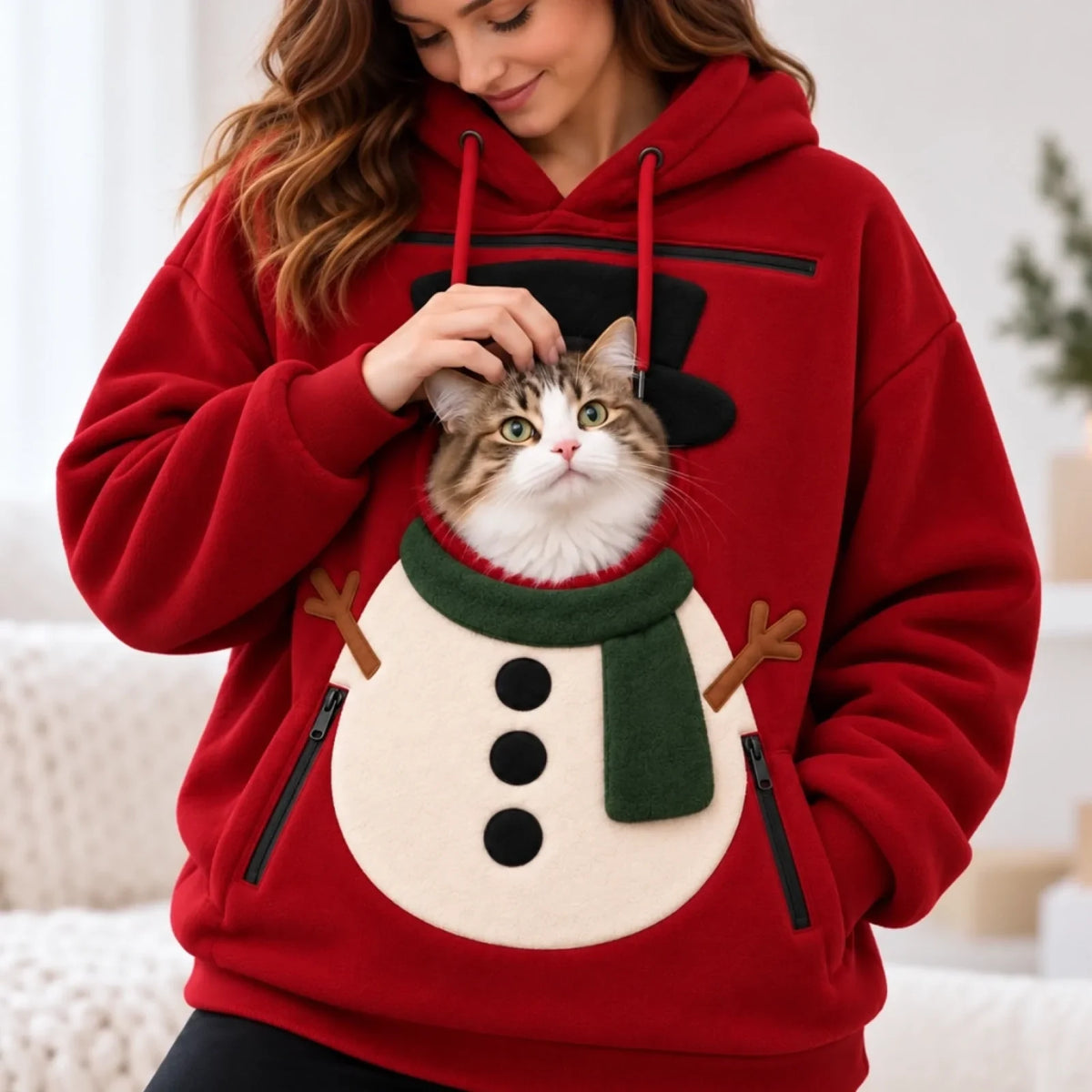 Red snowman pet-pouch hoodie with a cat looking through the opening
