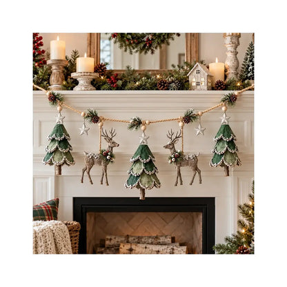 Three tree and two deer woodland garland in a warm daytime mantel setting