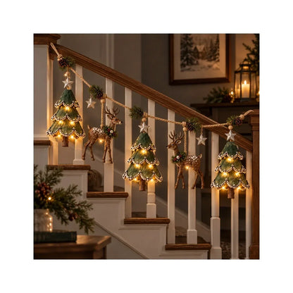 Lighted woodland tree and deer garland along a welcoming holiday staircase