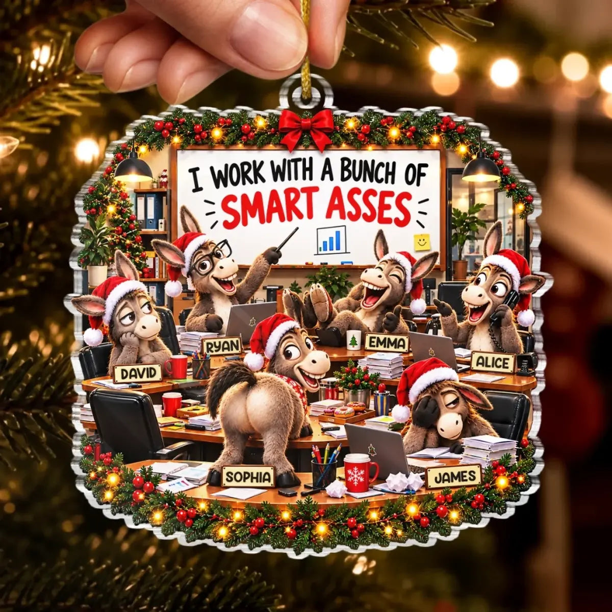 Hand holding a donkey coworker Christmas ornament with named characters, desks and holiday garlands.