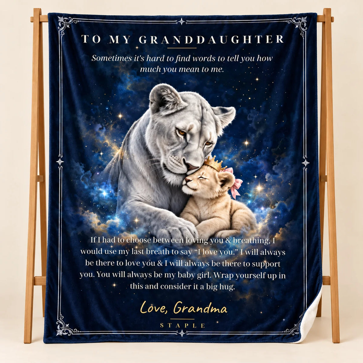Illustrative studio mockup of To My Granddaughter velveteen blanket with Love, Grandma message, on wooden stand with white reverse corner.
