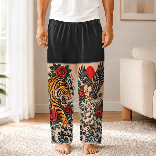 Front of black tattoo-leg illusion pajama pants worn by an adult