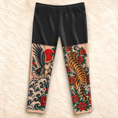 Flat back view of tiger, eagle and wave-print pajama pants