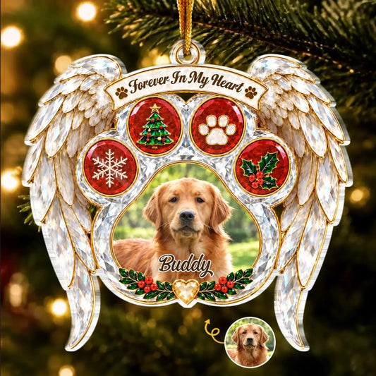 Angel wing pet memorial ornament with a dog photo, Buddy name and Forever In My Heart message on a Christmas tree.