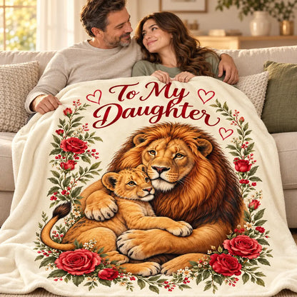 Illustrative father-and-adult-daughter lifestyle scene with the To My Daughter golden lion floral blanket across their laps on a sofa.