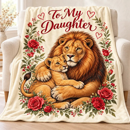 Illustrative mockup of To My Daughter golden lion floral blanket draped over a cream armchair, with a golden father lion and cub framed by red roses.