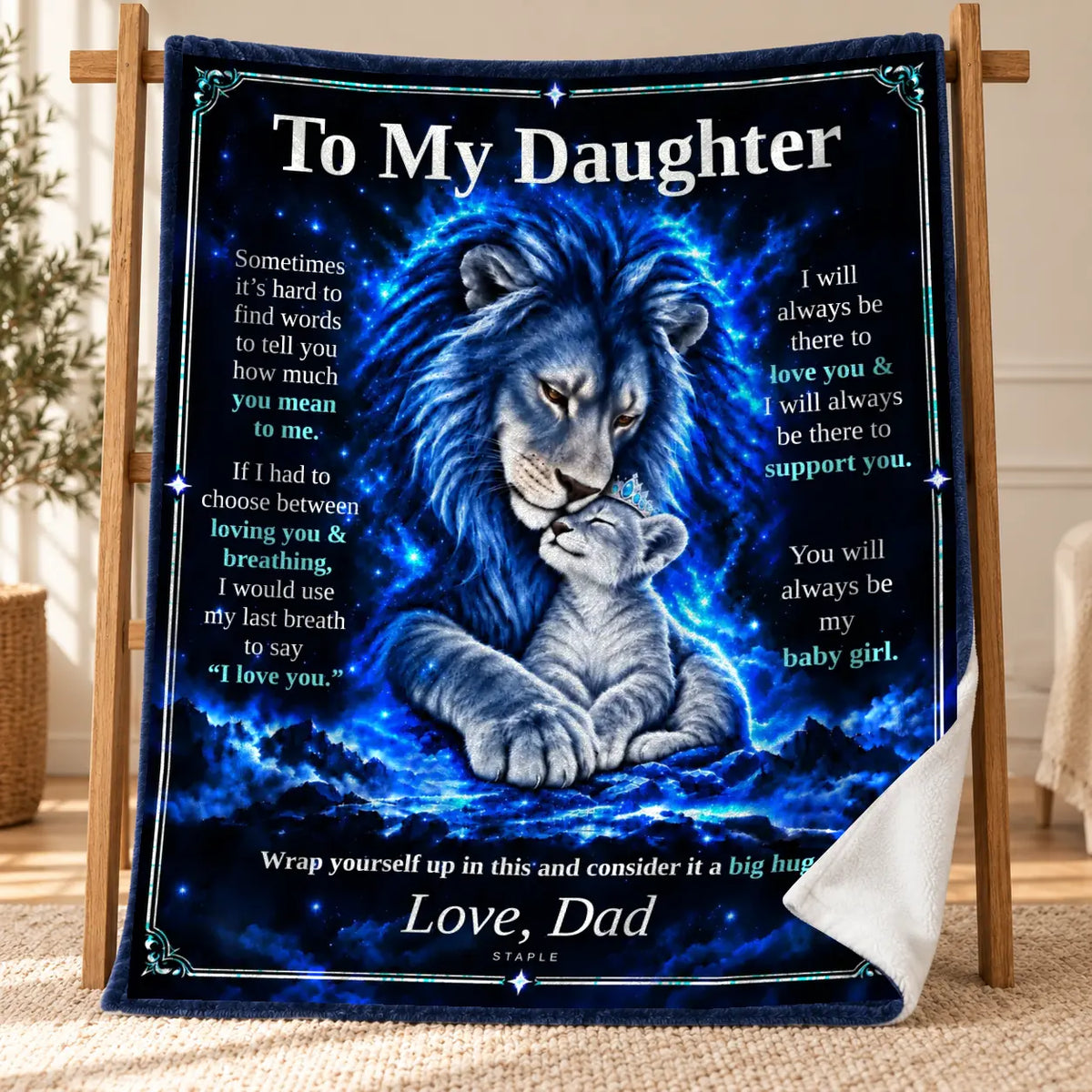 Original Blue To My Daughter blanket from Dad displayed on a wooden stand, with a curled corner showing its white velveteen reverse.