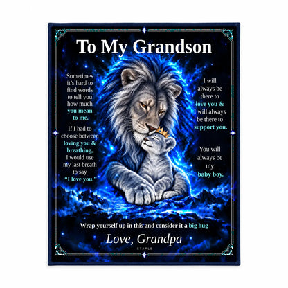Illustrative studio mockup: To My Grandson lion blanket displayed against a white studio background, showing the Original Blue artwork and Love, Grandpa signature.