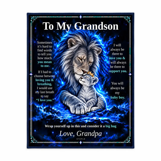 Illustrative studio mockup: To My Grandson lion blanket displayed against a white studio background, showing the Original Blue artwork and Love, Grandpa signature.