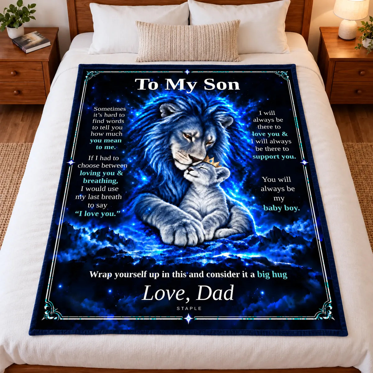 Illustrative bedroom mockup: To My Son lion blanket displayed full-size on a bed, showing the Original Blue artwork and Love, Dad signature.
