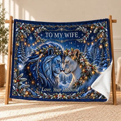 Original Blue To My Wife Winter Lion blanket displayed on a wooden stand, with a curled corner showing its white velveteen reverse.